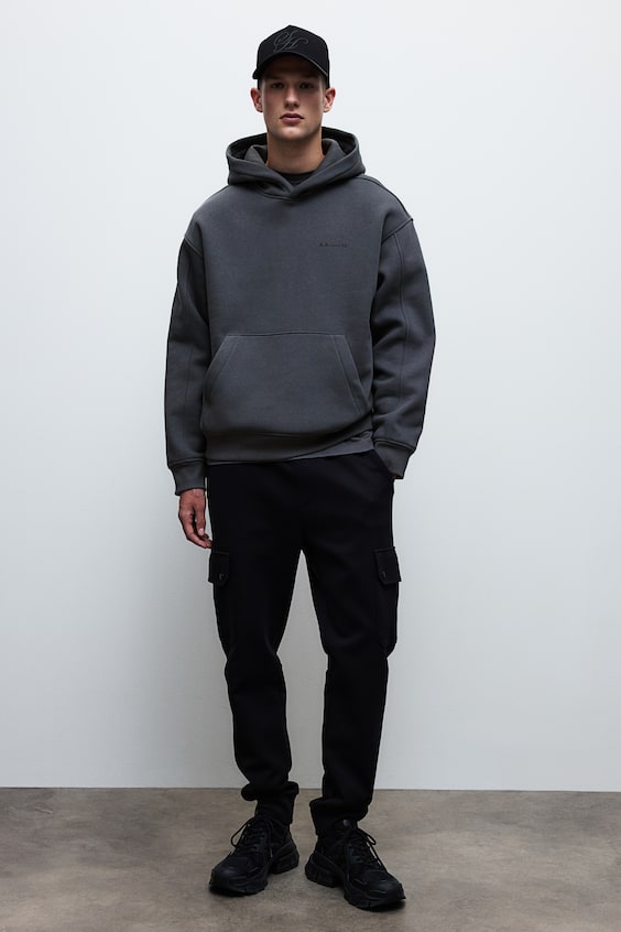 HM Bedruckter Hoodie in Oversized Fit Saisonschlussverkauf