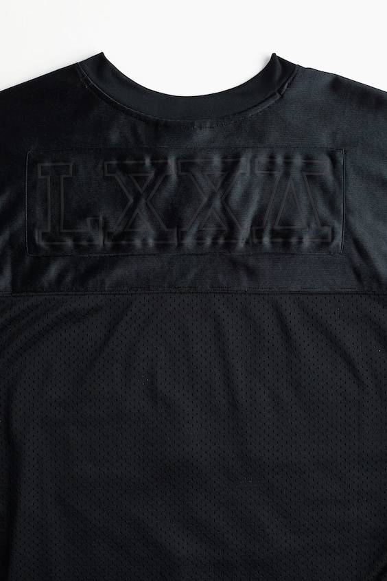 HM Loose Fit Printed sports top in DryMove™ Große Rabatte